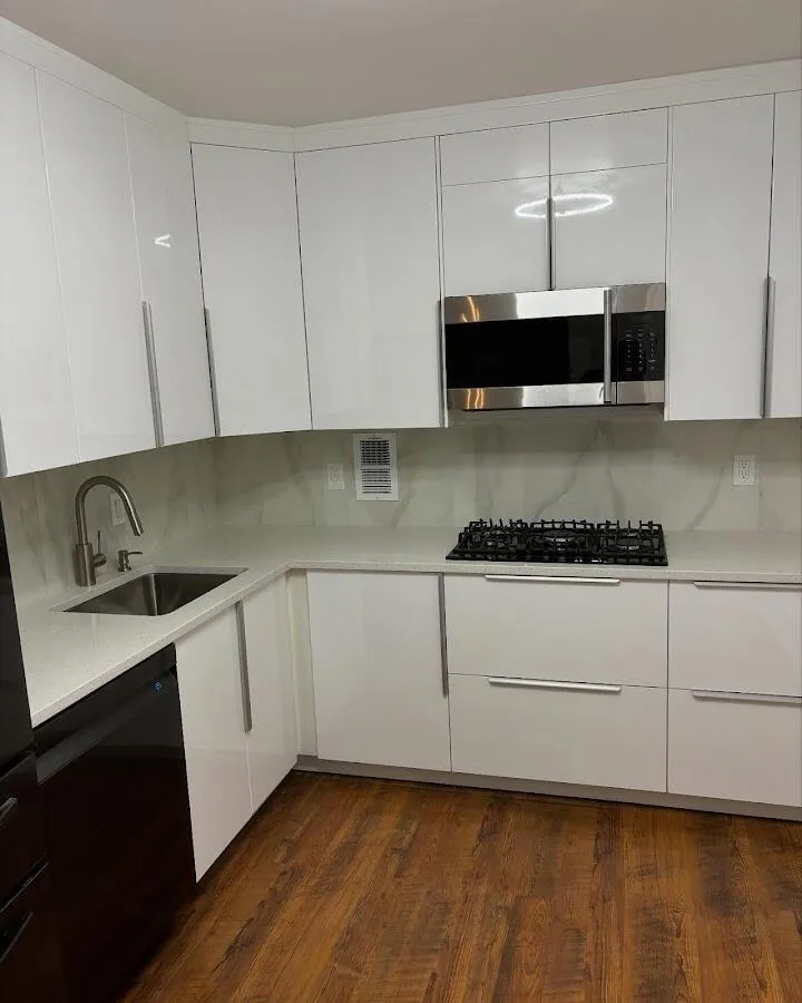 Restored kitchen with white cabinets after water damage in Bladensburg